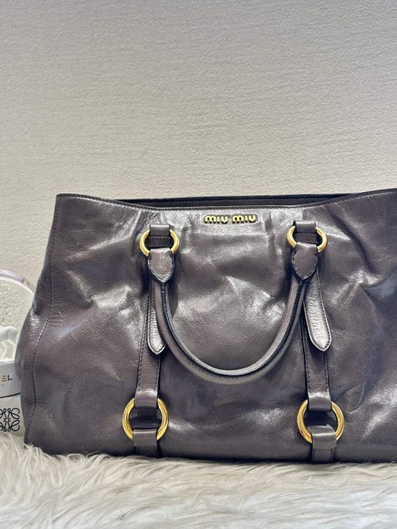 Preloved Miumiu 2way motorcycle bag 11564